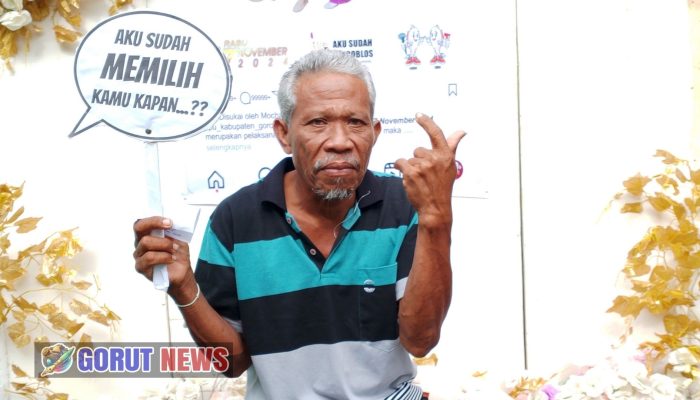 Suasana Meriah di TPS 002 Desa Botumoputi, Pesta Demokrasi dengan Sentuhan Adat
