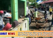 Sertu Parman Bersama Masyarakat Bersihkan Saluran di Dusun Lomuli