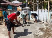 Babinsa Koramil 02/Atinggola Bersama Warga Gelar Karya Bakti di Dusun Hulawa