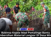 Babinsa Kopda Ikbal Pomalingo Bantu Pembersihan Material Longsor Di Desa Windu