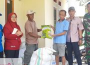 Babinsa Koramil 1314-01/Kwandang Dampingi Penyerahan Bantuan Bibit Padi di Desa Cisadane