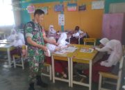 Babinsa Kwandang Salurkan 636 Porsi Makanan Bergizi di Tiga Sekolah di Kwandang