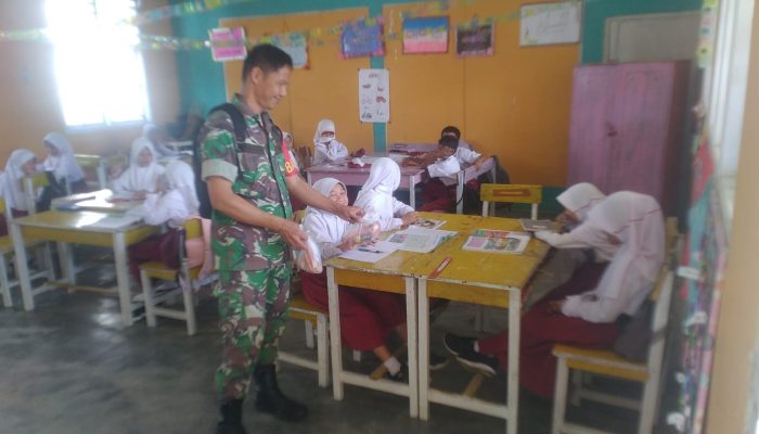 Babinsa Kwandang Salurkan 636 Porsi Makanan Bergizi di Tiga Sekolah di Kwandang