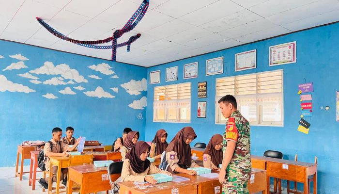 Babinsa Koramil Kwandang Dampingi Pelaksanaan Makan Bergizi Gratis di Kwandang