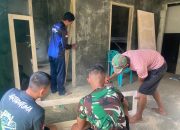 Satgas TMMD ke-124 Kodim 1314/Gorut Tuntaskan Tahap Pemasangan Pintu Rumah Rustam Didipu