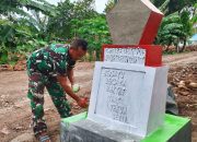 Babinsa Koramil 1314-01/Kwandang Cat Tugu TMMD di Desa Ombulodata