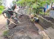 Koramil Atinggola Bersama Warga Desa Imana Gotong Royong Bersihkan Saluran Air