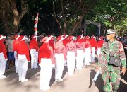 Serma Ismail Hasan Sigap Kendalikan Kemacetan Gerak Jalan Tingkat Kecamatan Anggrek