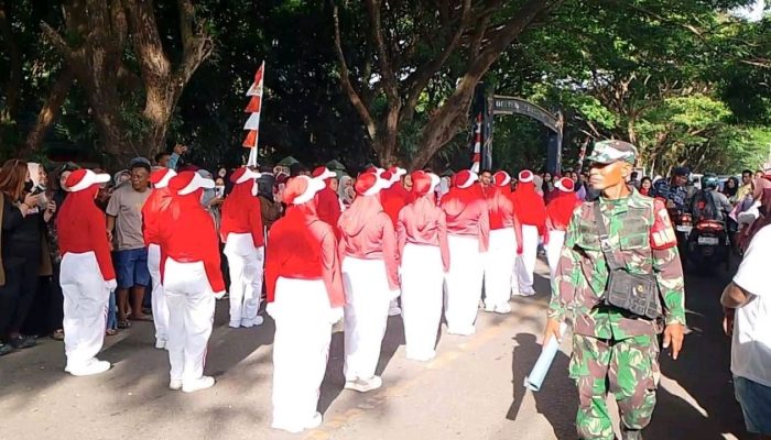 Serma Ismail Hasan Sigap Kendalikan Kemacetan Gerak Jalan Tingkat Kecamatan Anggrek