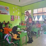Babinsa Koramil 1314-01/Kwandang Dampingi Pendistribusian Makan Bergizi untuk Pelajar