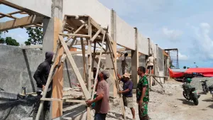 Babinsa Koramil Kwandang Dampingi Pembangunan Koperasi Desa di Hari Libur