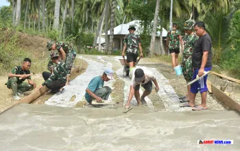 Jalan Rabat Beton TMMD 128: Solusi Mobilitas Aman Bagi Warga Boalemo di Musim Hujan