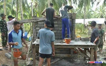 Dinding MCK Umum Mulai Berdiri, Satgas TMMD 128 Kodim 1316/Boalemo Pacu Pembangunan demi Sanitasi Warga
